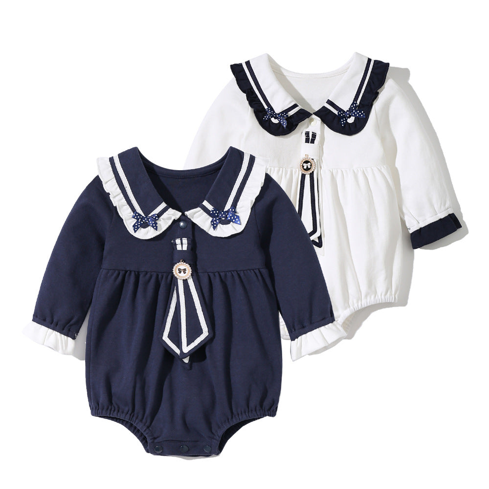 Baby girl sailor bodysuit in white and navy blue with a playful tie-dye patched design