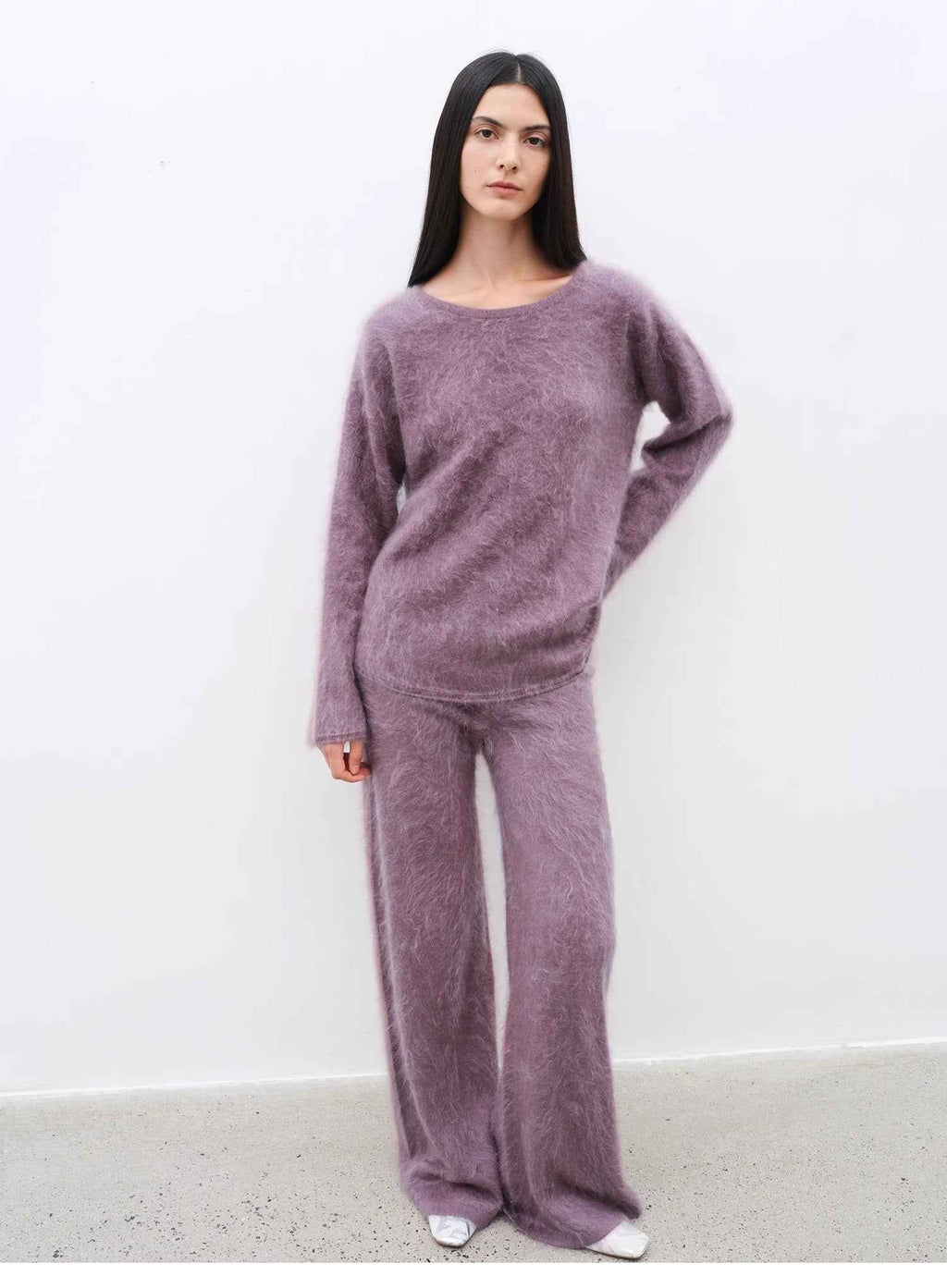 Women's purple two-piece cashmere lounge set featuring a loose crewneck sweater and wide-leg pants
