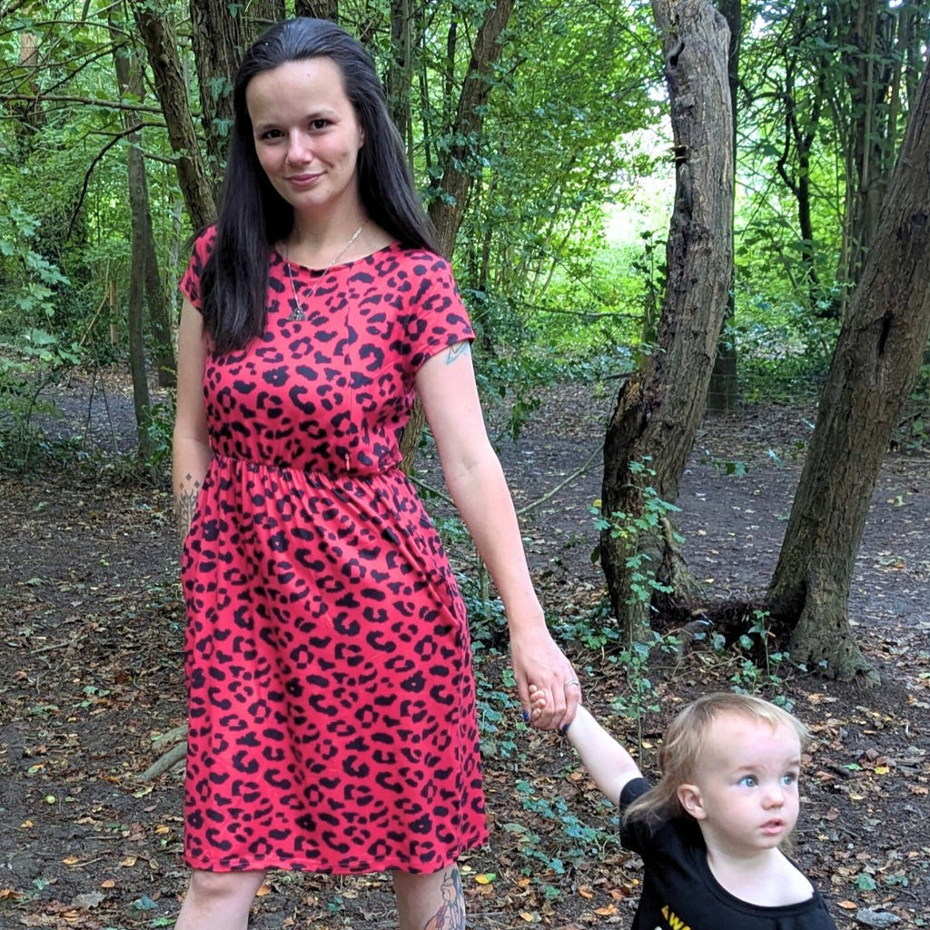 Knee length red leopard print breastfeeding dress with short sleeves and hidden nursing zips — view 3