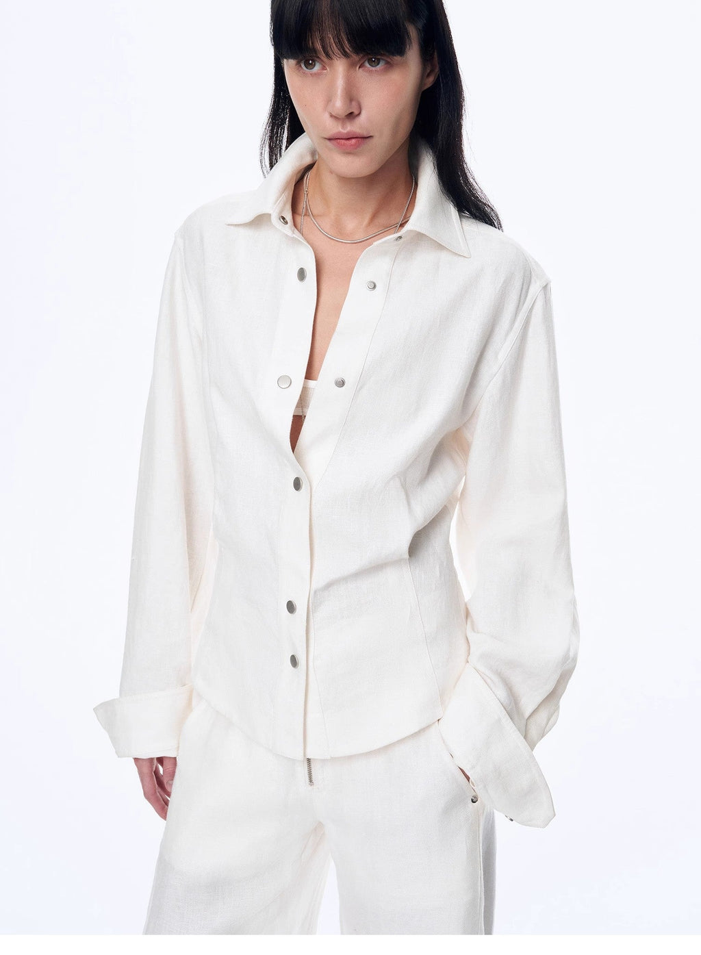 Women's deconstructed blue linen twill blouse with waist pleats in an old money style — view 3