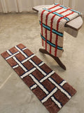 Retro contrast checker bedside runner rug with ultra soft tufted plush texture and bold geometric design
