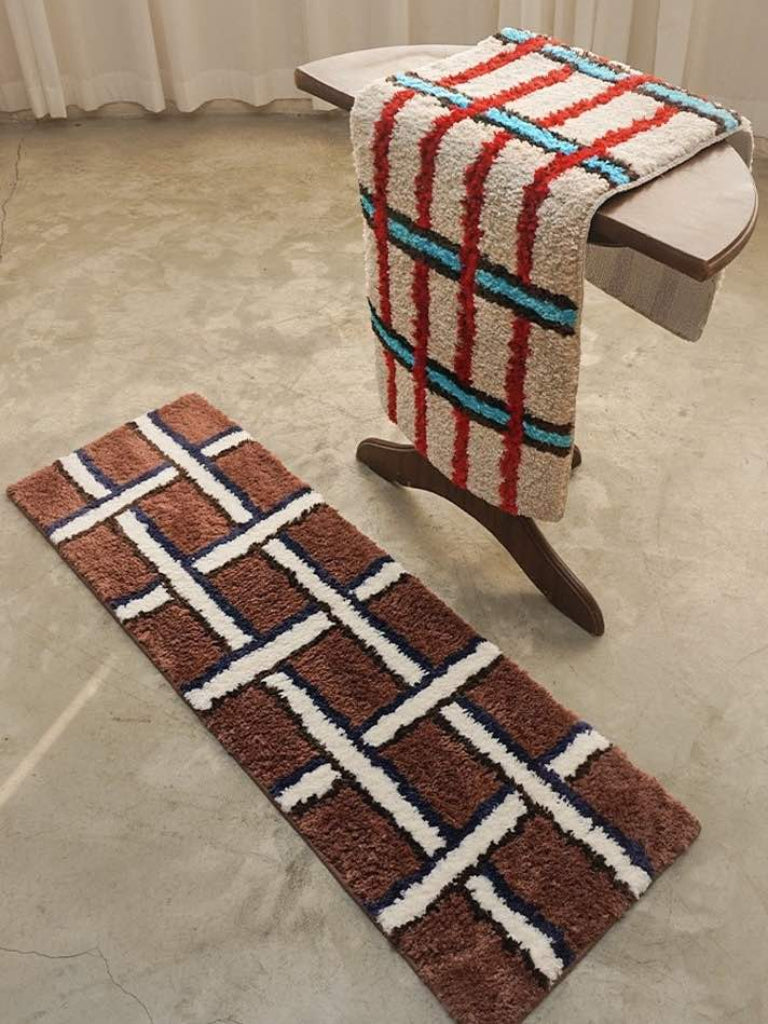 Retro contrast checker bedside runner rug with ultra soft tufted plush texture and bold geometric design