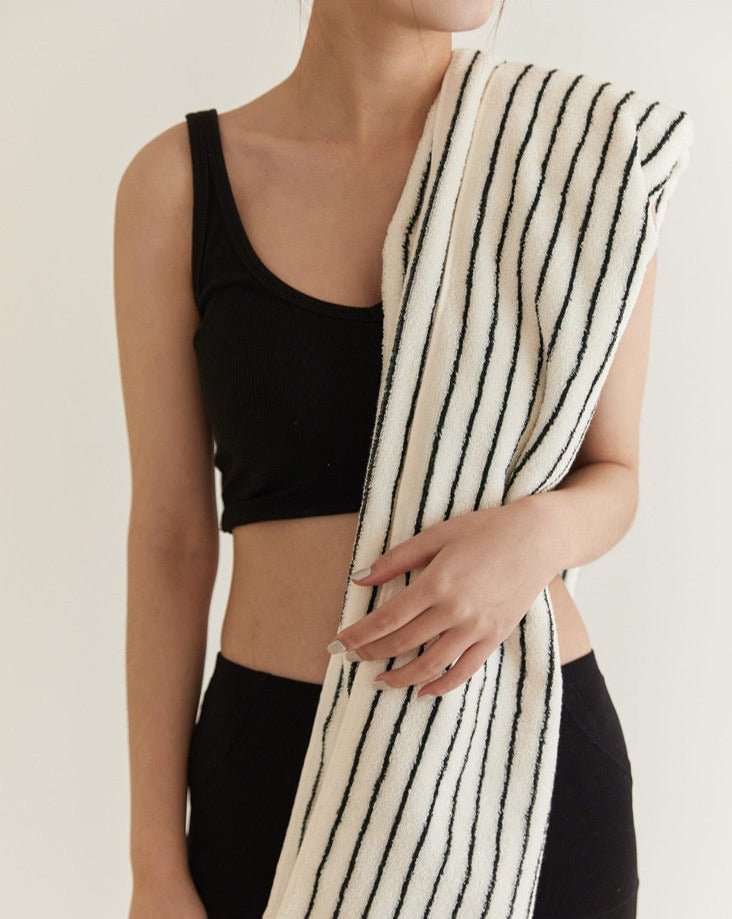 Retro style striped organic combed cotton bath towel folded elegantly in a modern bathroom setting — view 5