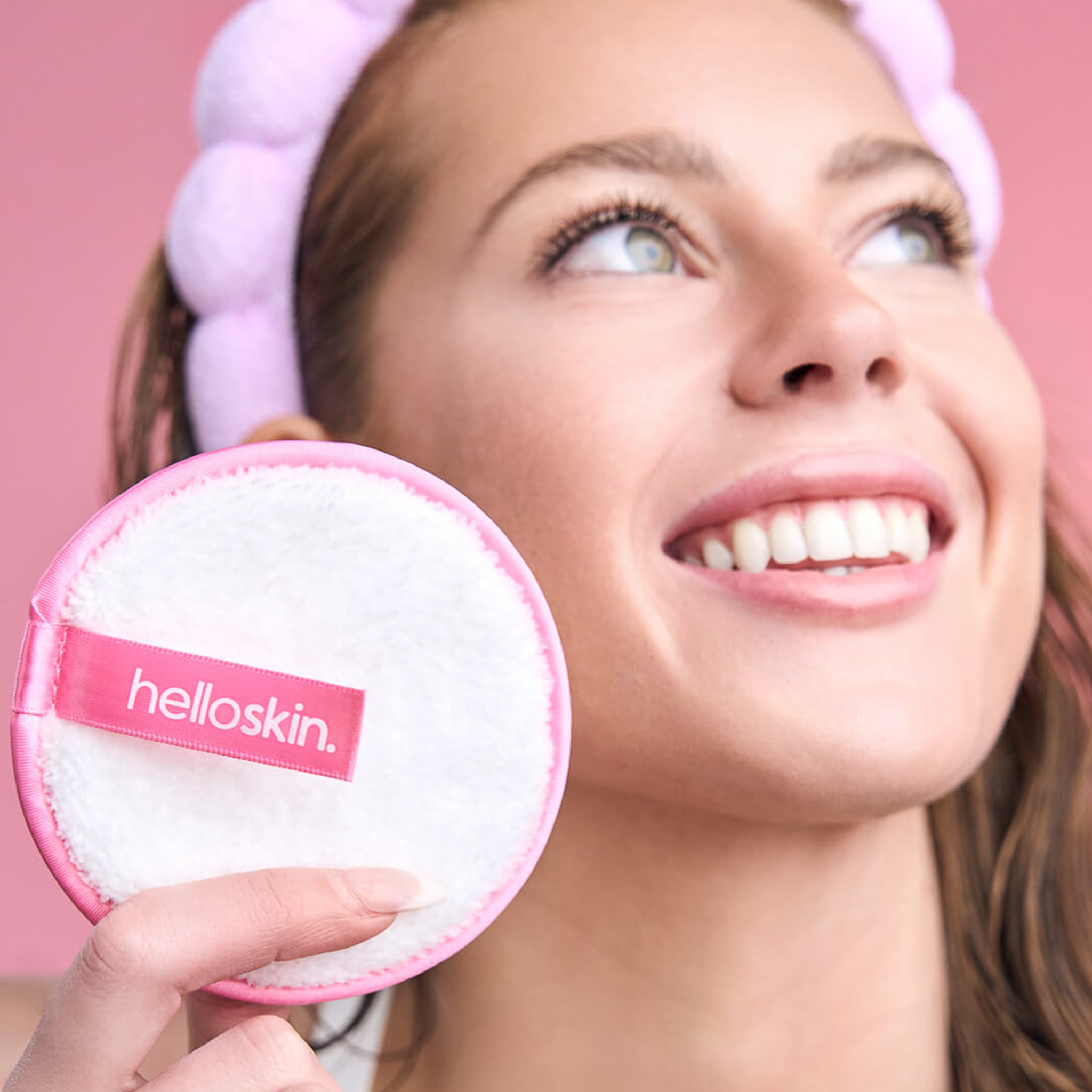Three reusable microfibre makeup remover puffs with a complimentary mesh laundry wash bag. — view 4