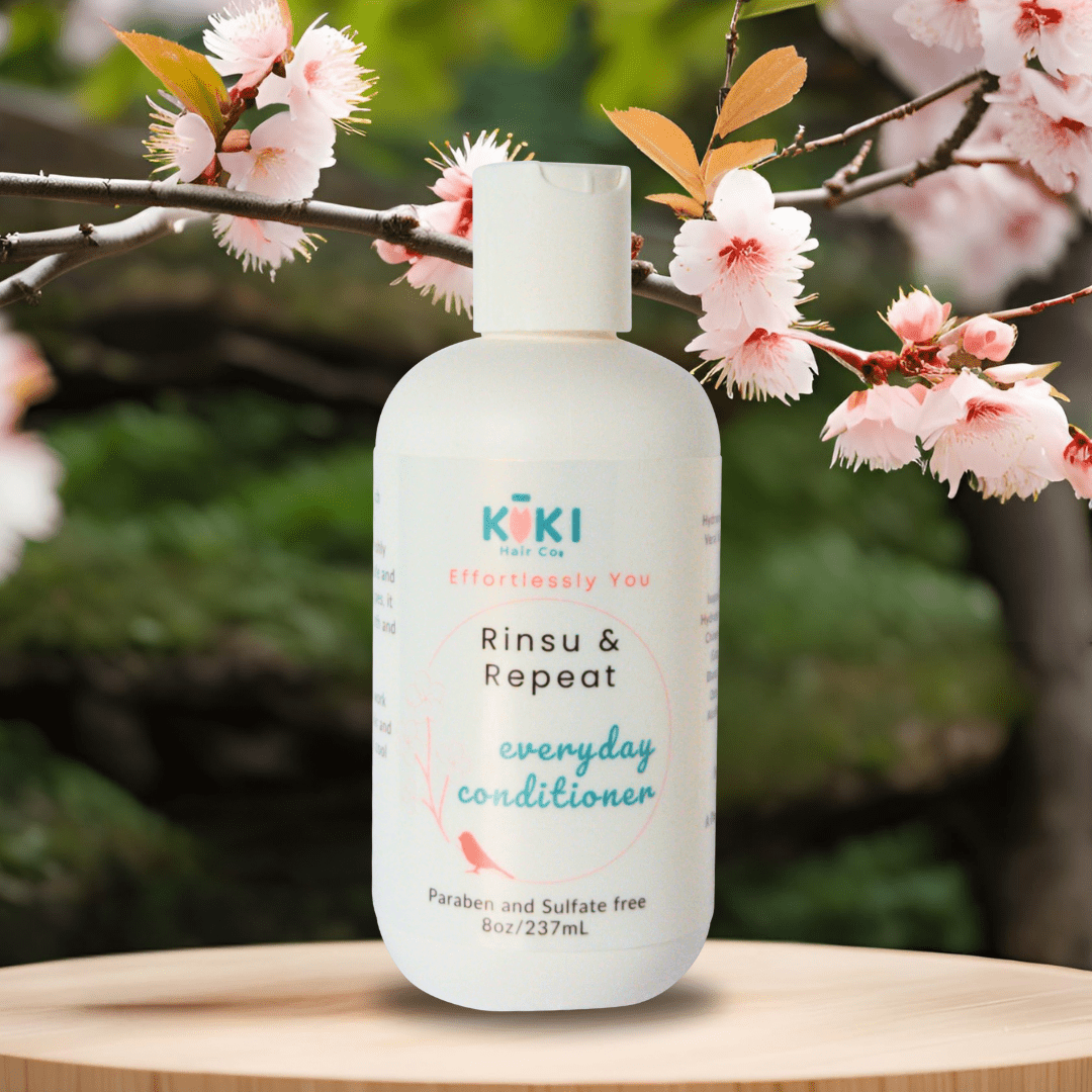 Lightweight daily conditioner bottle showing clean branding with aloe vera and essential oil natural ingredients