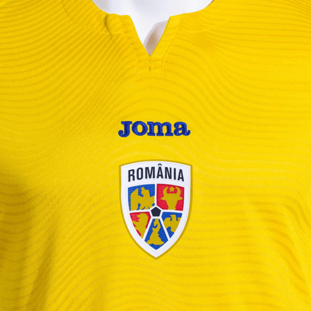 Romania home soccer jersey 2025 in classic yellow with breathable fabric and athletic fit — view 3