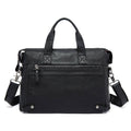 Men's vintage leather briefcase in rustic cowhide with silver hardware and adjustable padded shoulder strap.