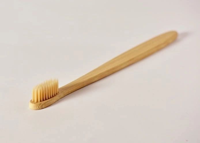 Natural bamboo toothbrush with soft bristles, eco-friendly wooden handle for sustainable daily oral care routine — view 2
