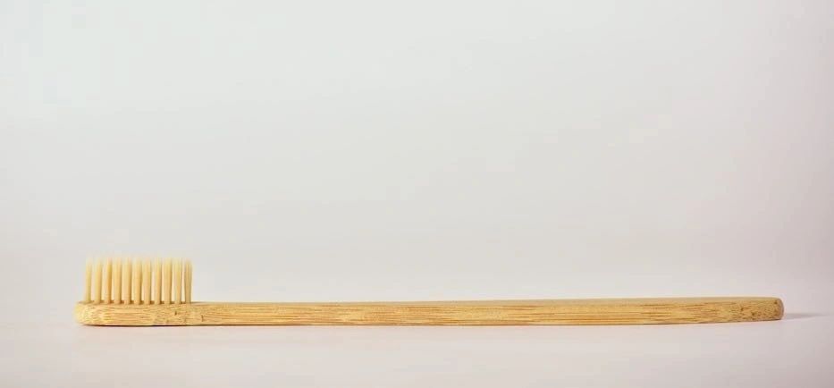 Natural bamboo toothbrush with soft bristles, eco-friendly wooden handle for sustainable daily oral care routine — view 4