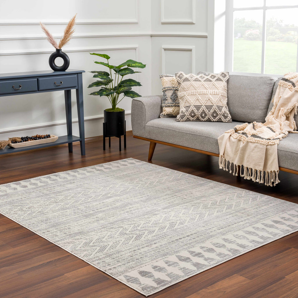 Hauteloom Chinnor area rug in light gray, charcoal, and off-white with transitional bohemian patterns — view 3