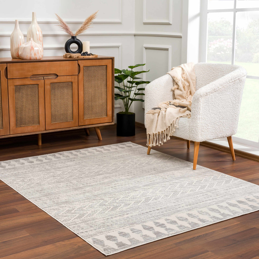 Hauteloom Chinnor area rug in light gray, charcoal, and off-white with transitional bohemian patterns — view 4