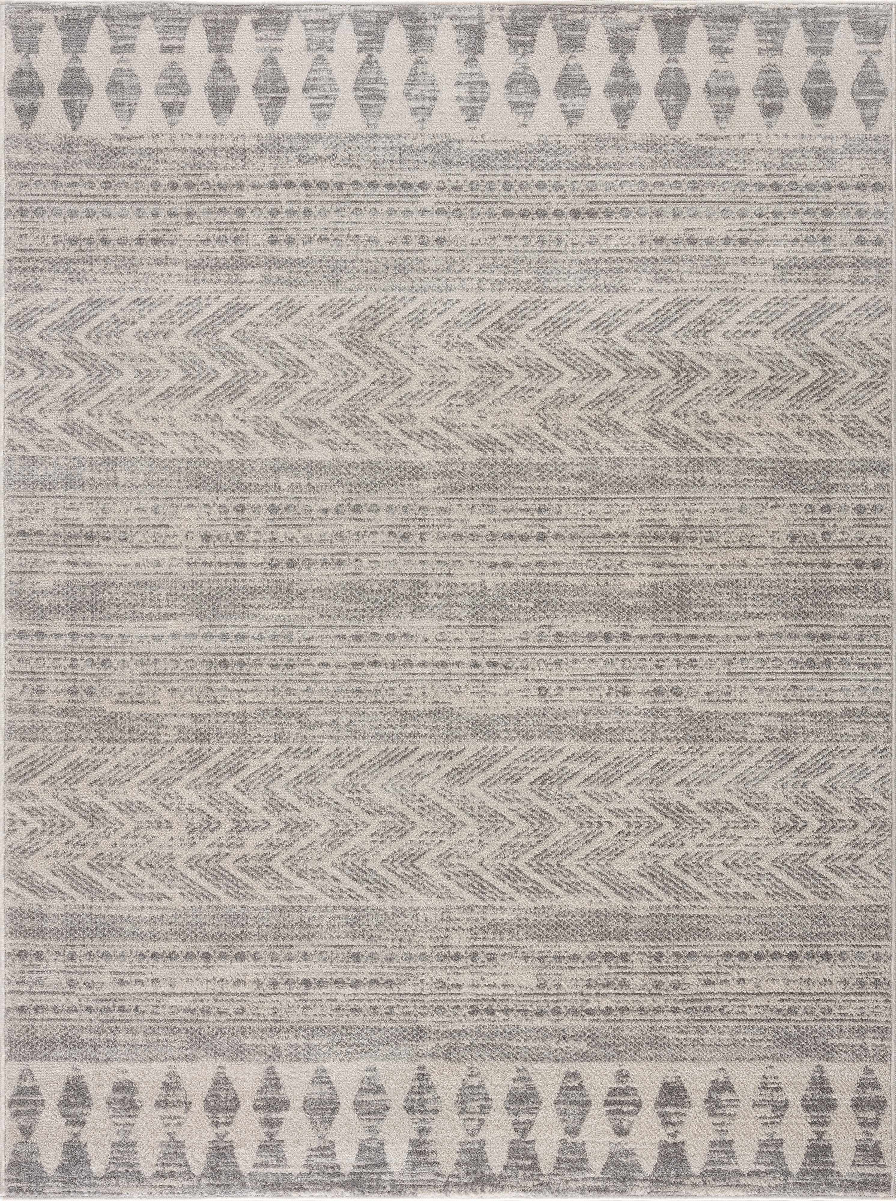 Hauteloom Chinnor area rug in light gray, charcoal, and off-white with transitional bohemian patterns