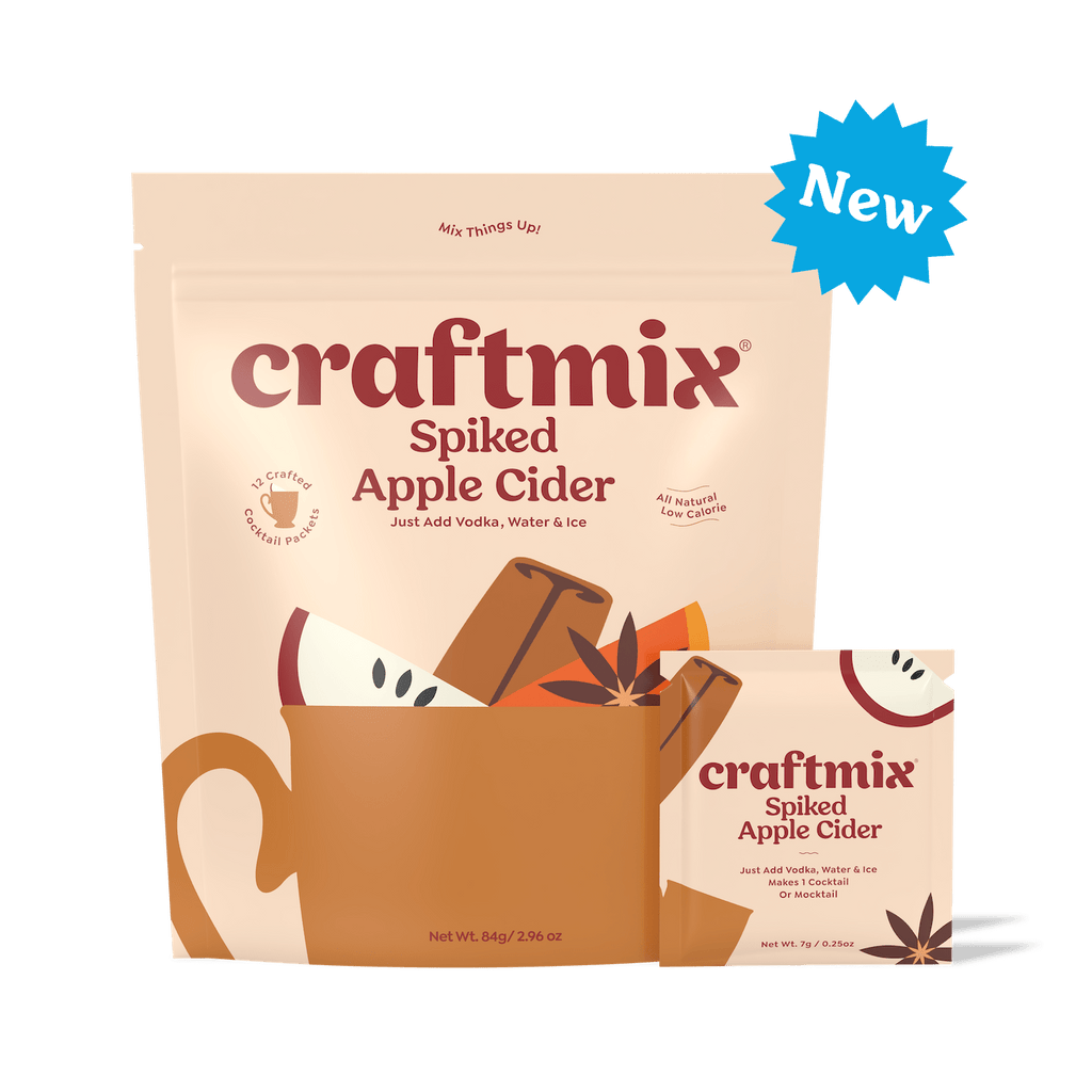 Craftmix Spiked Apple Cider cocktail mix packets arranged for cozy autumn and holiday entertaining