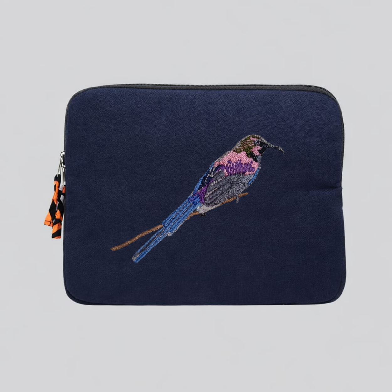 Tacazze Sunbird cotton canvas laptop sleeve featuring detailed bird embroidery in warm earthy colors — view 2
