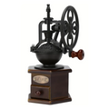Manual coffee grinder vintage mill in black with a cast iron hand crank and wooden base