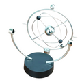 Mixed color tabletop Newton's cradle pendulum desk decor piece showing perpetual motion kinetic art