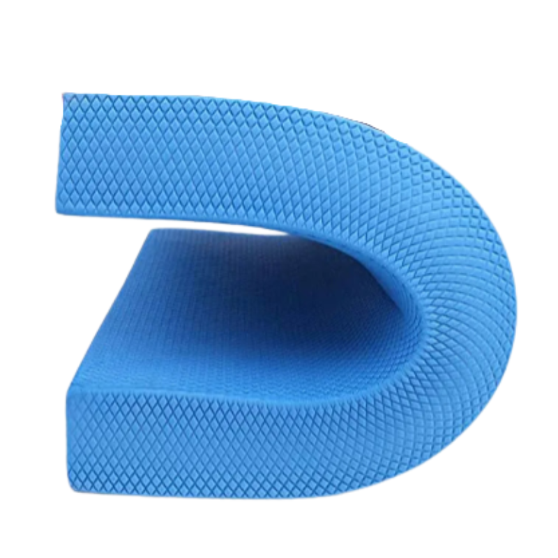 Blue TPE yoga balance pad with non-slip surface and included fitness resistance band.