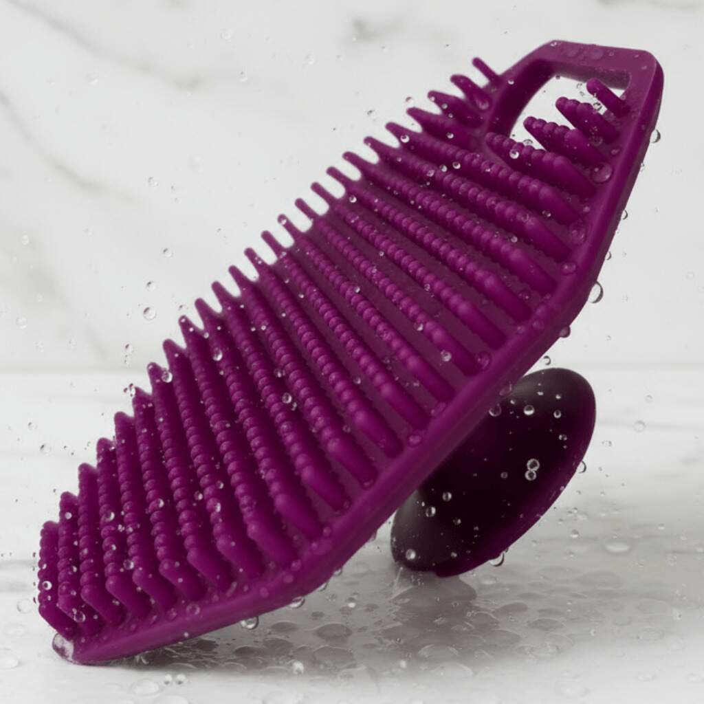 Compact silicone exfoliating face scrubber with soft bristles for gentle daily facial cleansing — view 3