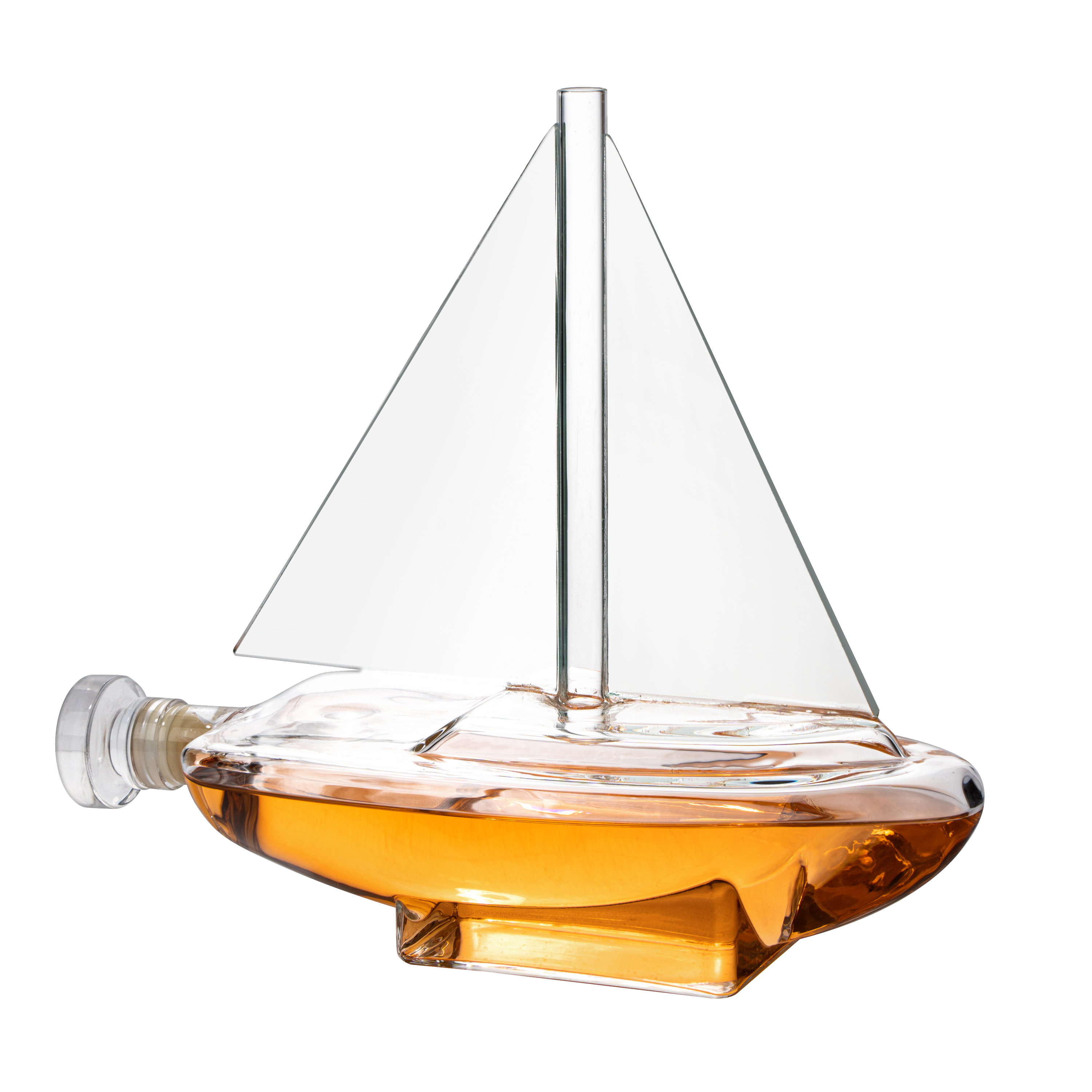 Glass sailboat whiskey decanter with built-in spigot resting on a sturdy wooden display base