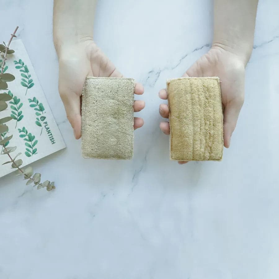 Eco-friendly compostable kitchen sponge with a cheerful orange citrus pattern, wood pulp, and loofah side. — view 5