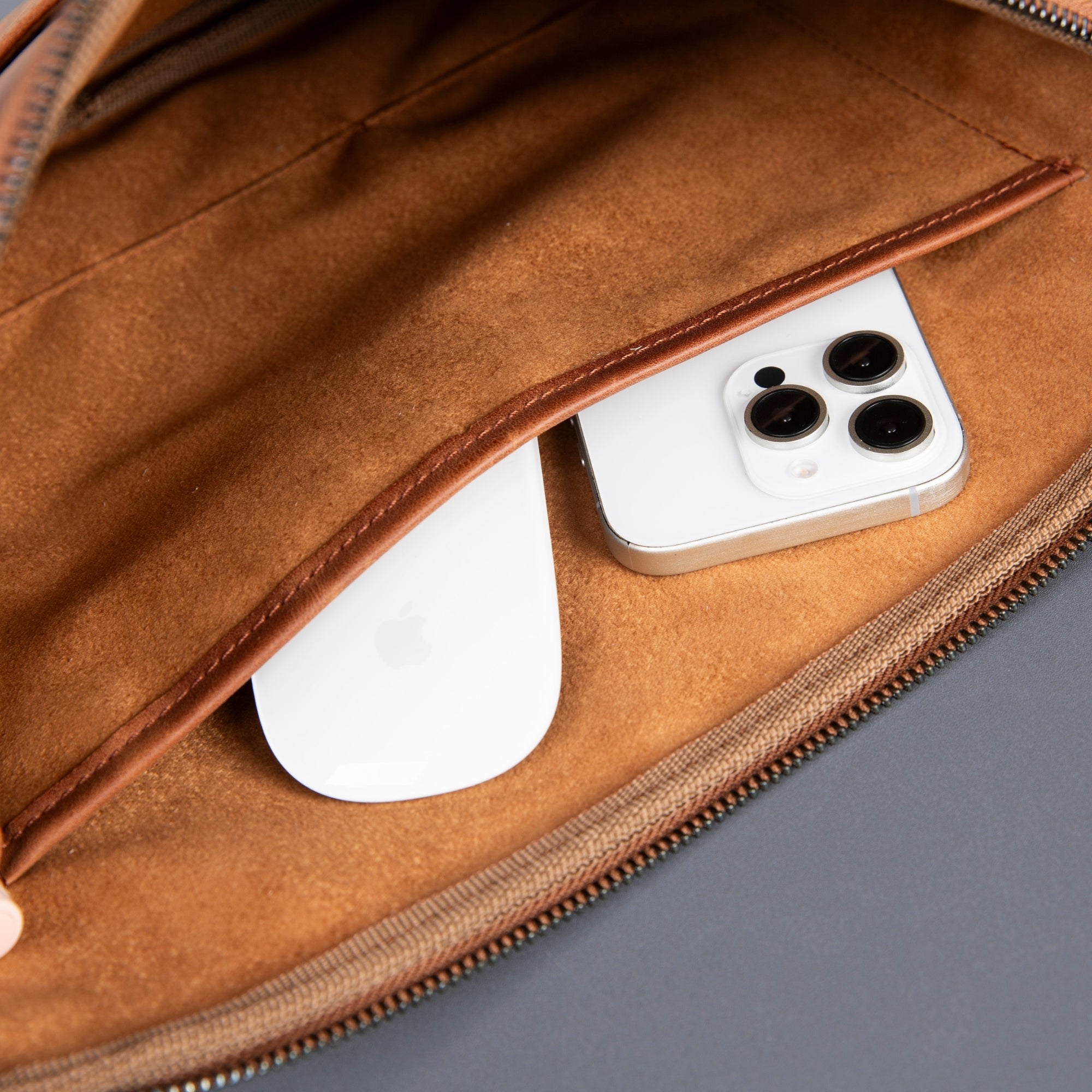 Genuine leather laptop bag with shoulder strap, soft suede interior, and front pocket for professional use. — view 4