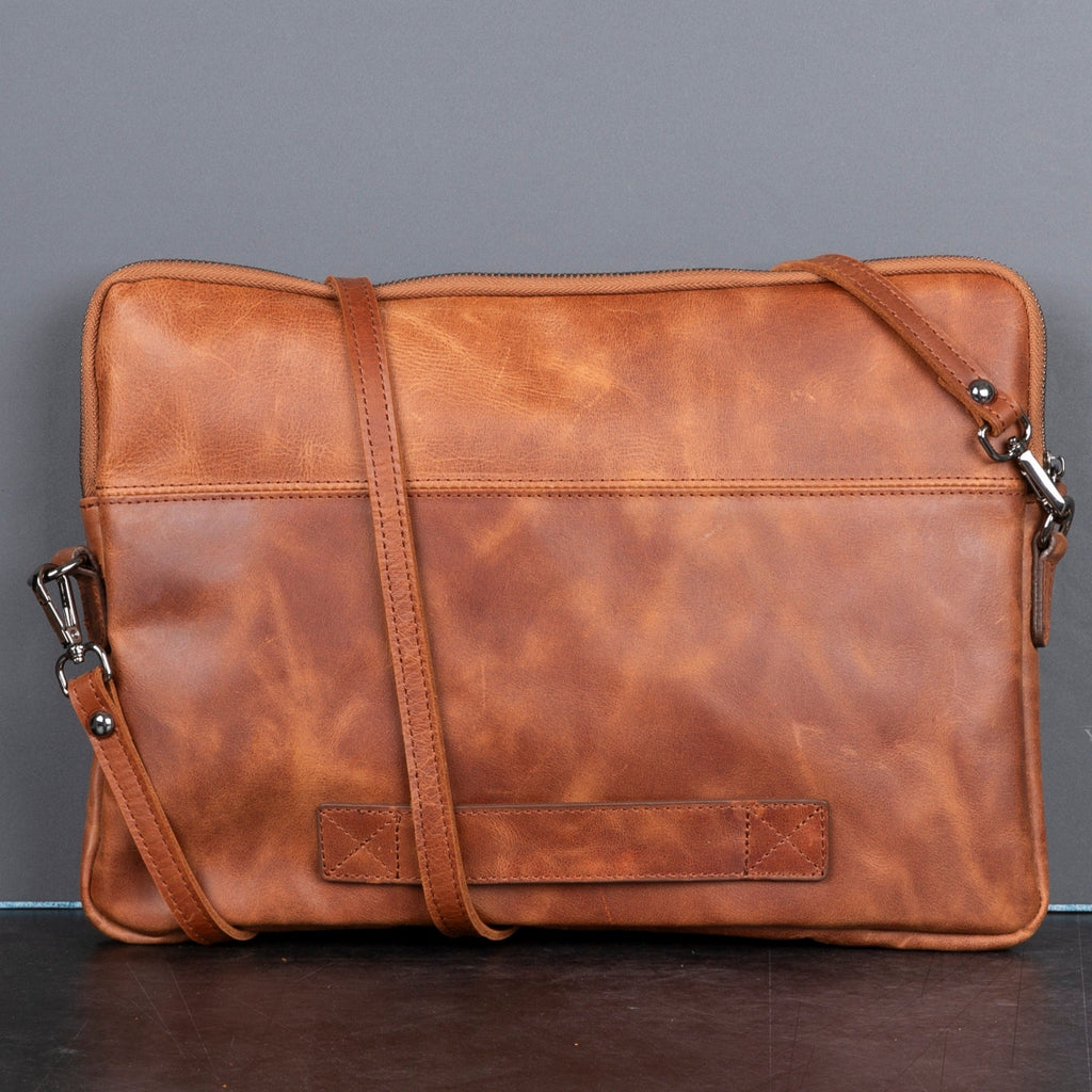 Genuine leather laptop bag with shoulder strap, soft suede interior, and front pocket for professional use. — view 3