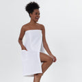 Women's organic Turkish cotton waffle towel wrap with adjustable closure and front pocket