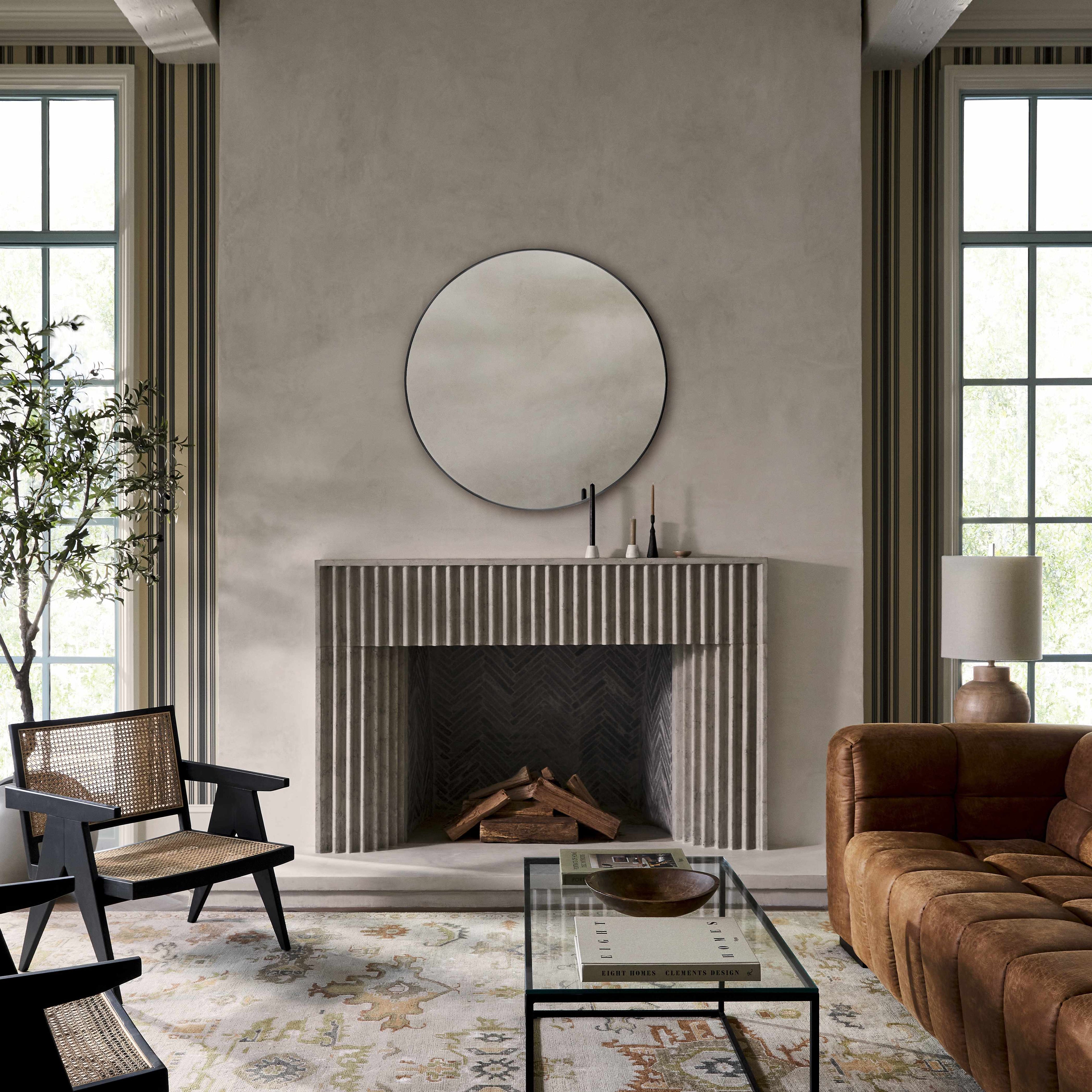 Contemporary round wall mirror with a sleek black aluminum frame, perfect for modern home interiors. — view 3
