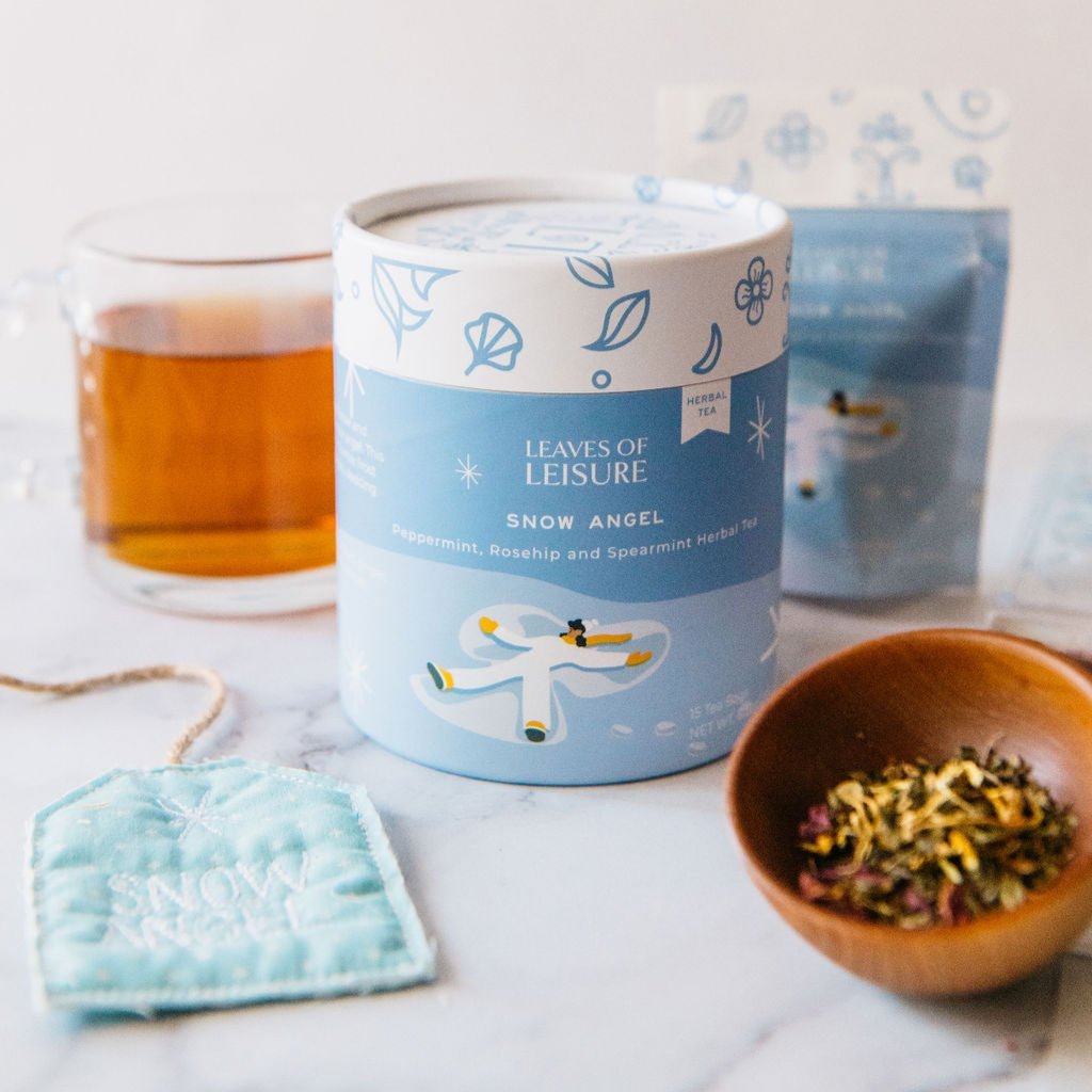 Snow Angel herbal tea blend in a reusable keepsake paper canister with compostable mesh bags — view 5