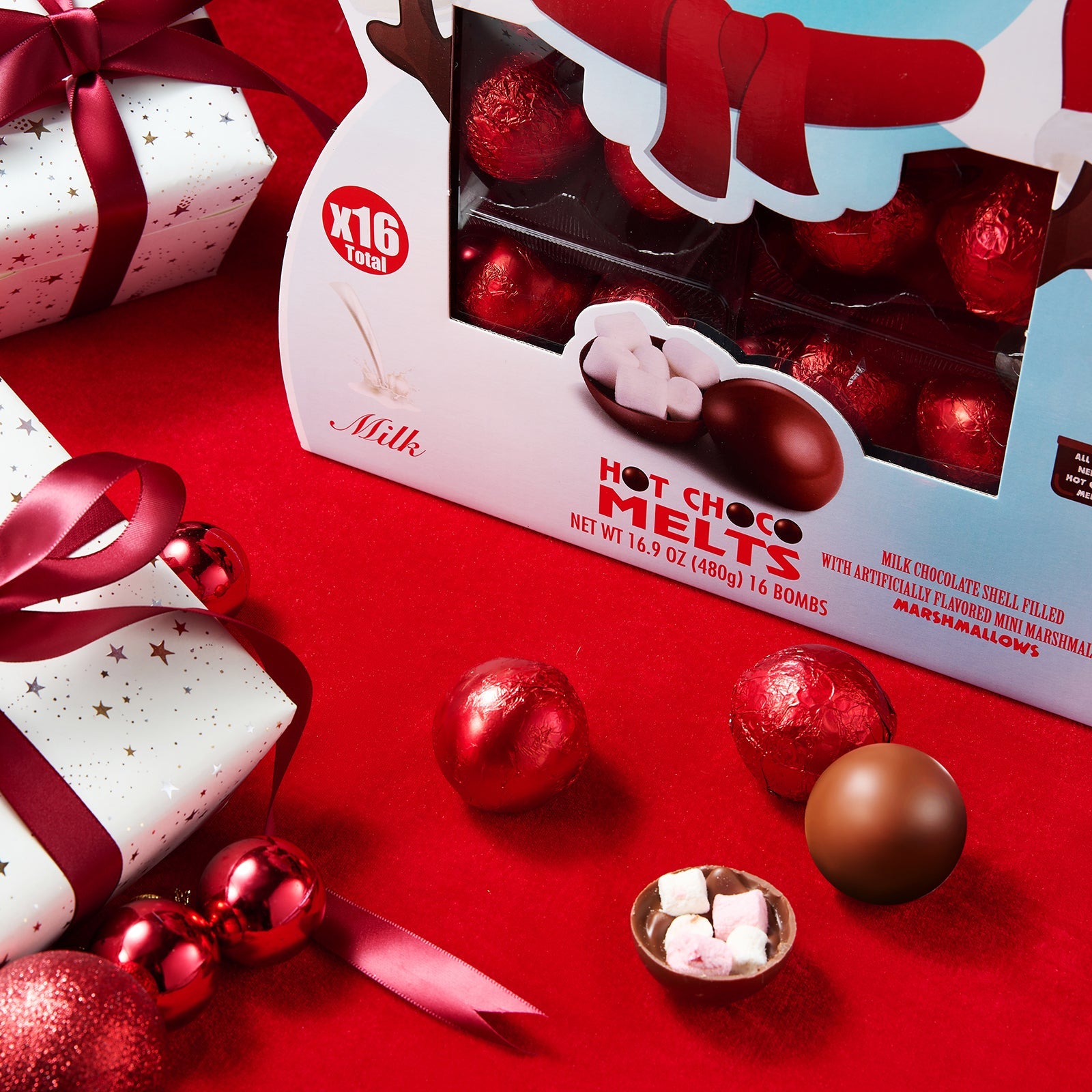Set of sixteen snowman hot chocolate bombs with milk chocolate, caramel, and fluffy mini marshmallows. — view 2