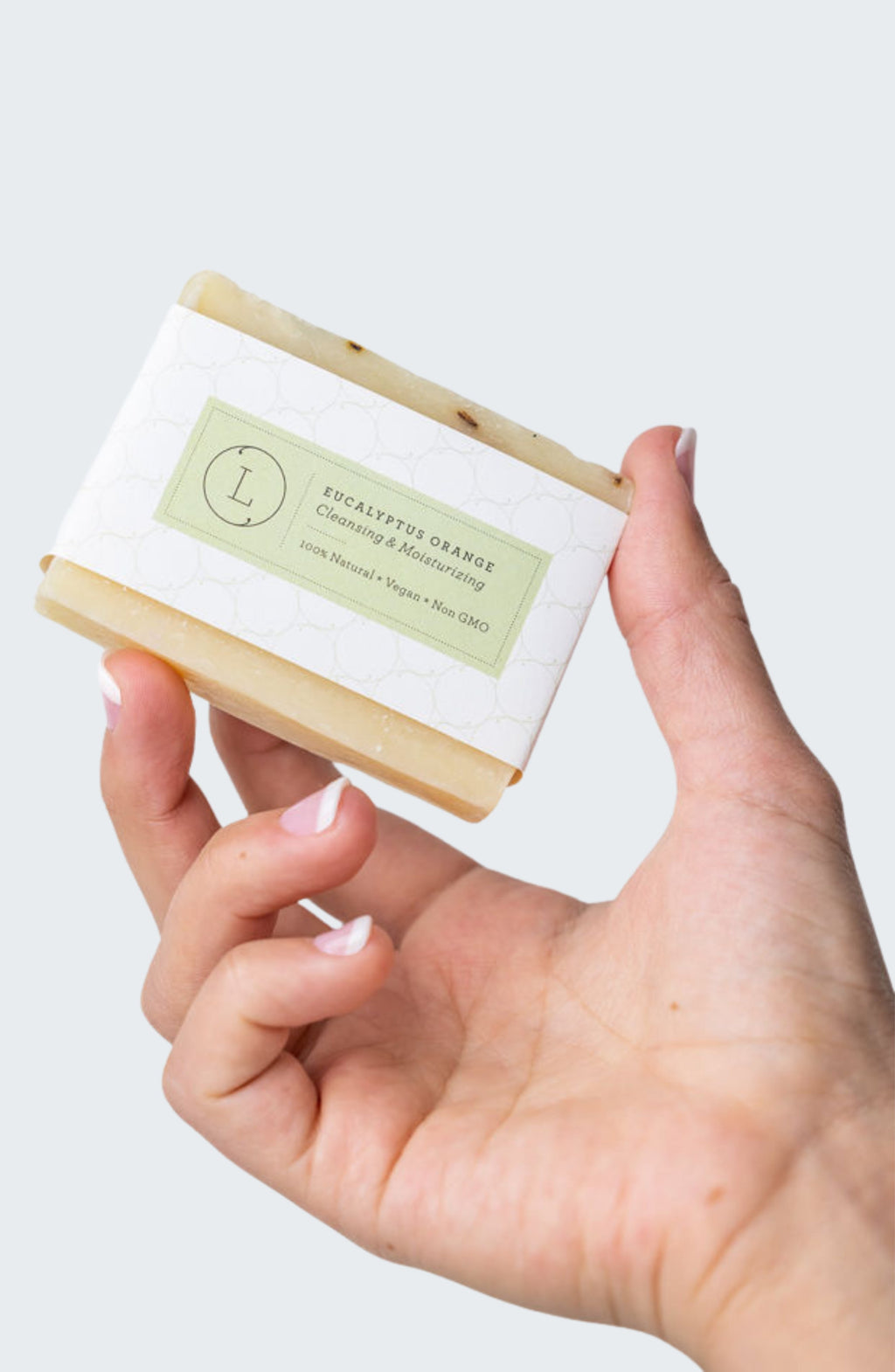 Two handmade natural eucalyptus cold process soap bars packed in a reusable cotton bag — view 2