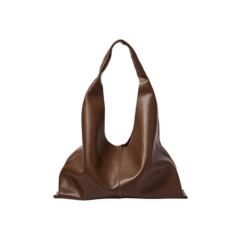 Soft slouch genuine leather oversized tote bag with comfortable shoulder strap and minimalist design