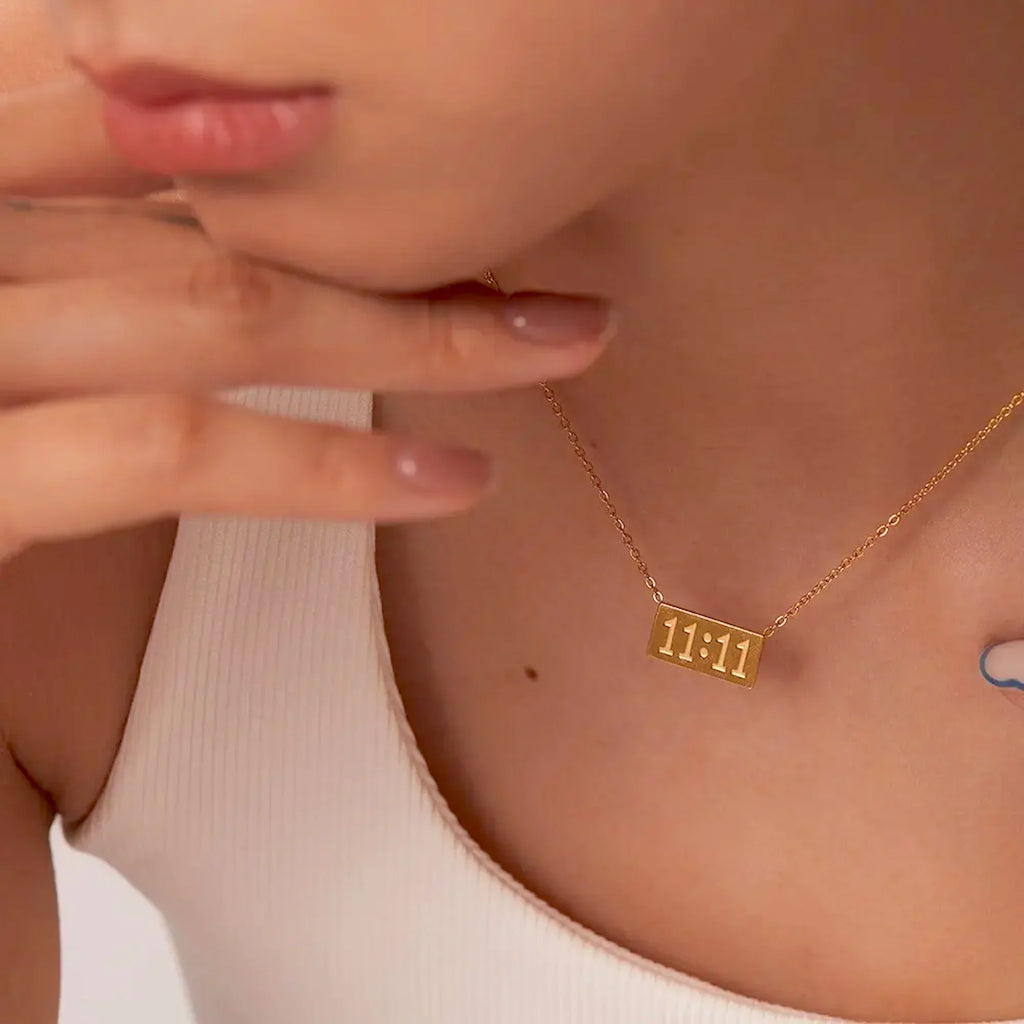 1111 angel number necklace featuring a polished minimalist pendant and an adjustable hypoallergenic chain — view 5