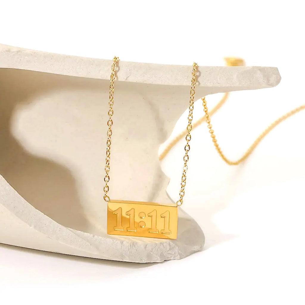 1111 angel number necklace featuring a polished minimalist pendant and an adjustable hypoallergenic chain — view 4