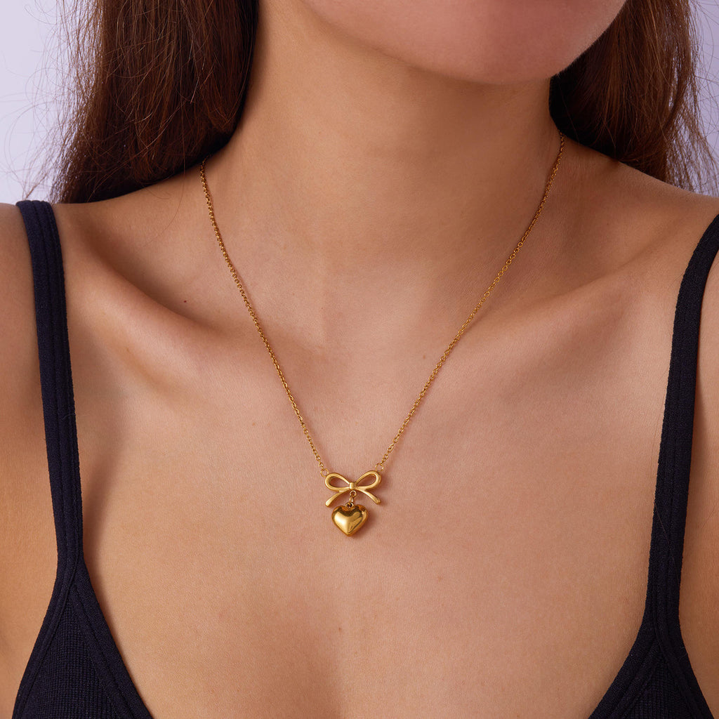 Dainty bow heart pendant necklace with polished finish and adjustable chain for women — view 2