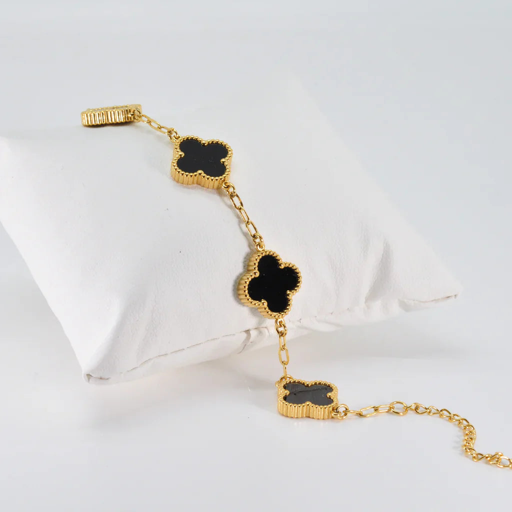 Elegant black four leaf clover charm bracelet featuring a minimalist adjustable band for women — view 5