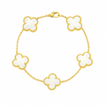 White four-leaf clover lucky charm bracelet on a minimalist adjustable gold-tone chain