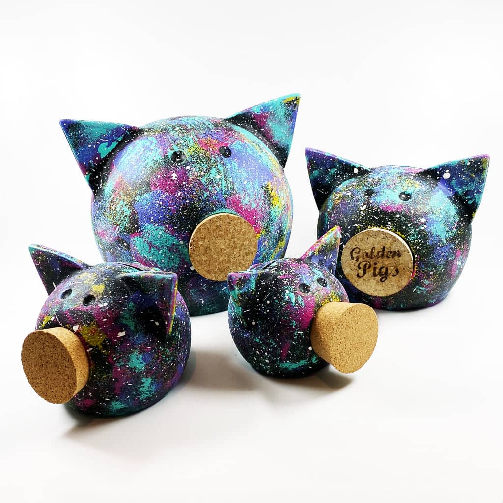 Handmade ceramic space piggy bank featuring a matte finish and a removable natural cork snout