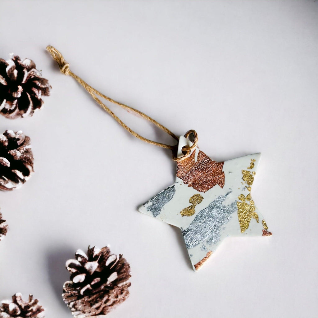 Set of three white polymer clay Christmas ornaments with gold silver and copper foil flakes. — view 4
