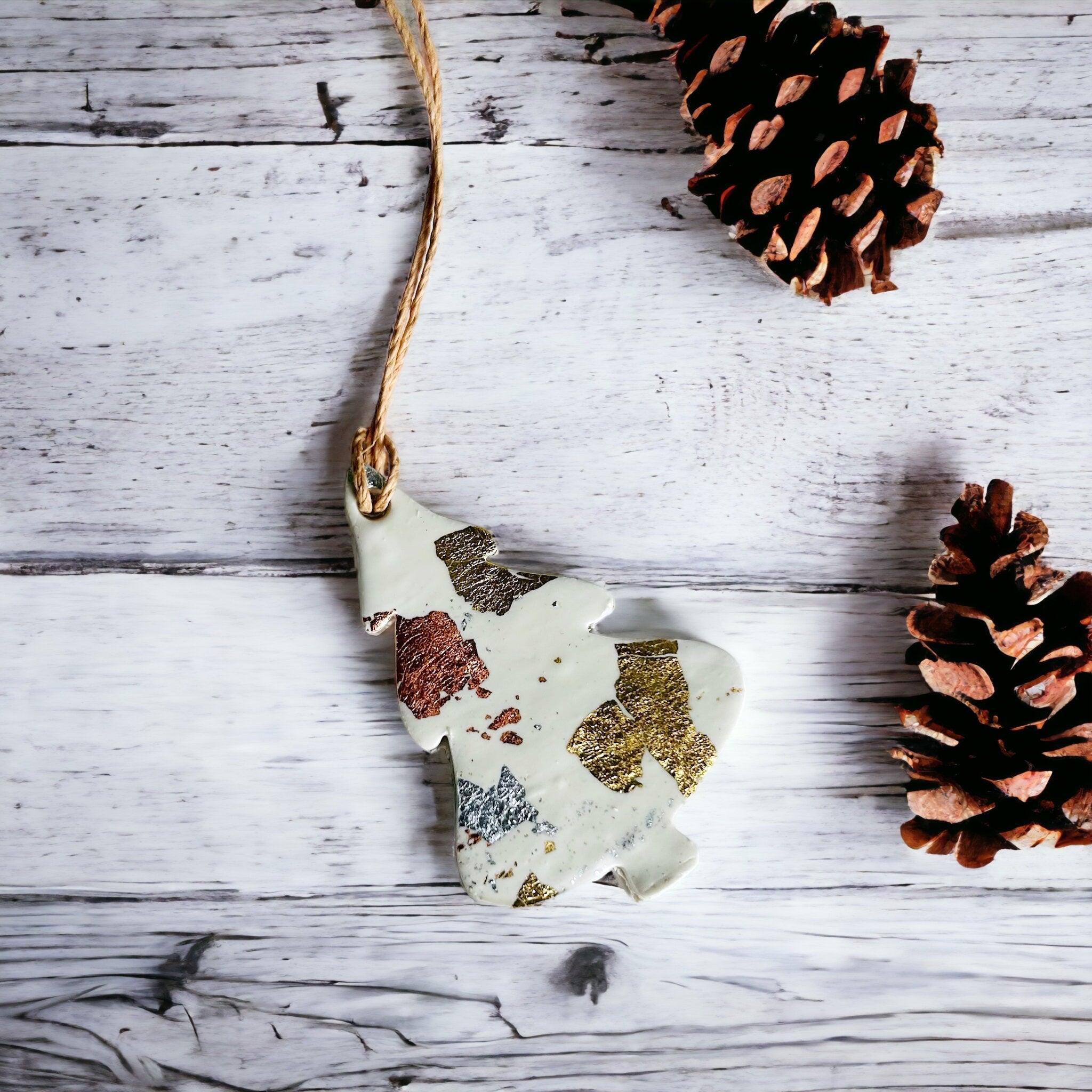 Set of three white polymer clay Christmas ornaments with gold silver and copper foil flakes. — view 3