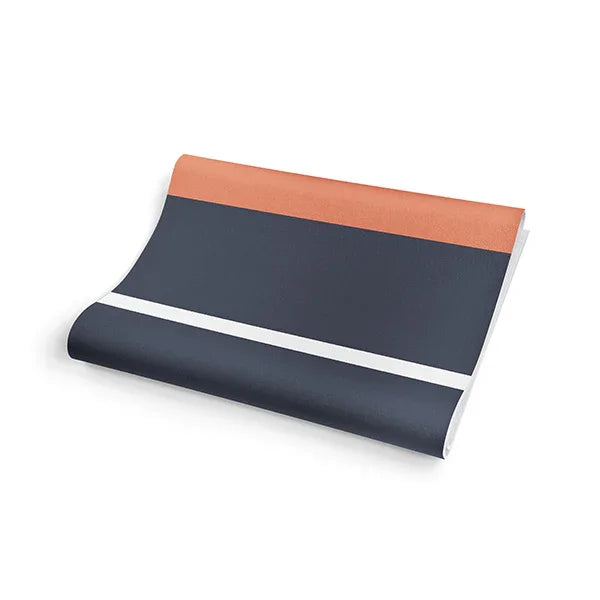 Houston yoga mat featuring a dark blue Space-City starry design unrolled on a studio floor — view 4