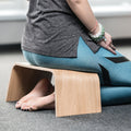 Minimalist wooden seiza meditation bench with a sleek plywood finish for comfortable posture