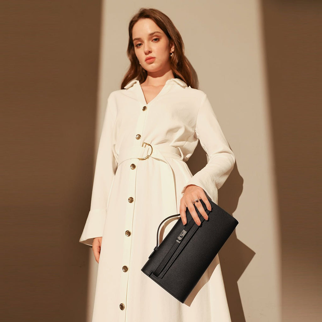 Structured saffiano leather top-handle clutch bag in elongated rectangular shape with silver turn-lock closure — view 2