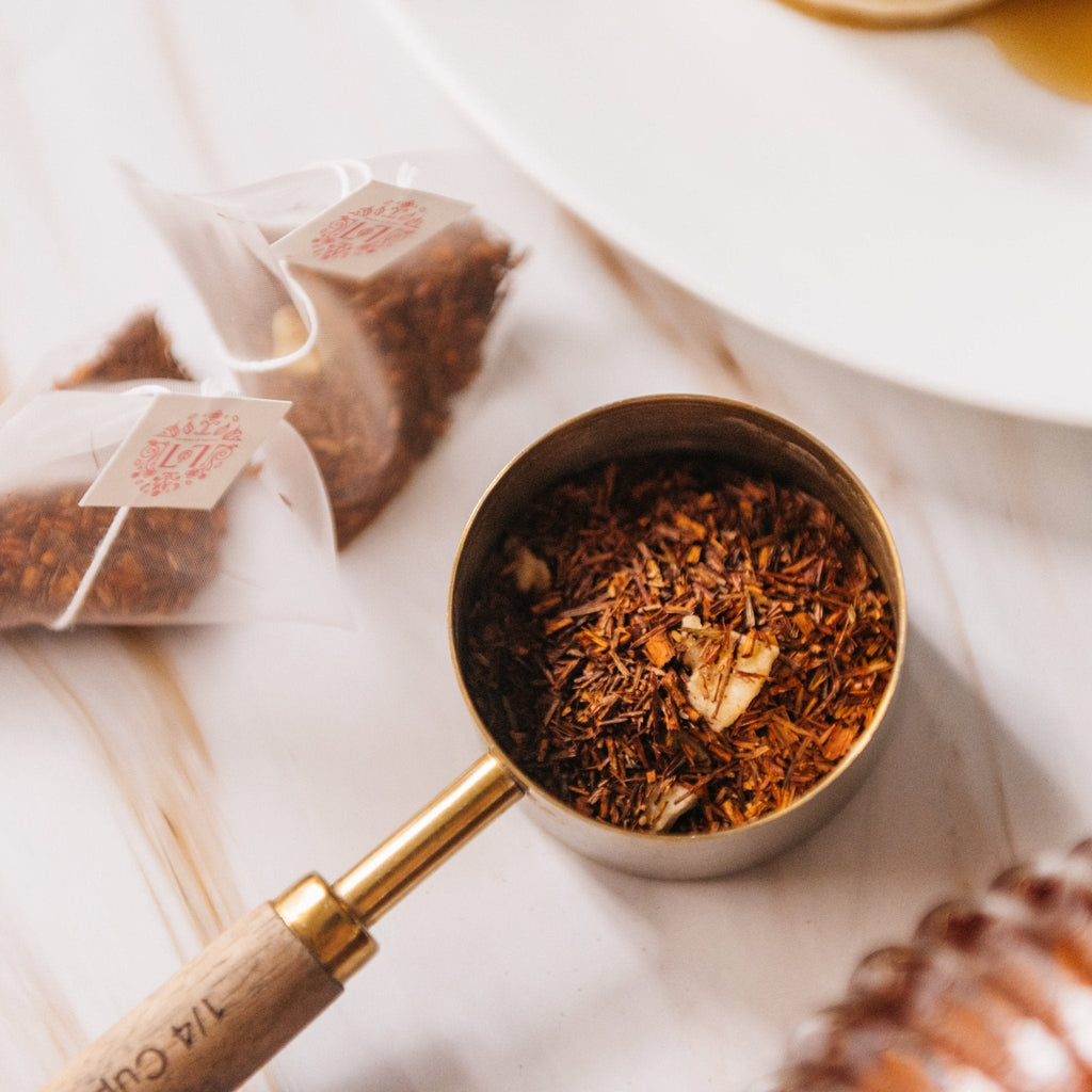 Sunday Pancakes herbal tea in a reusable paper canister alongside compostable corn mesh tea bags — view 5