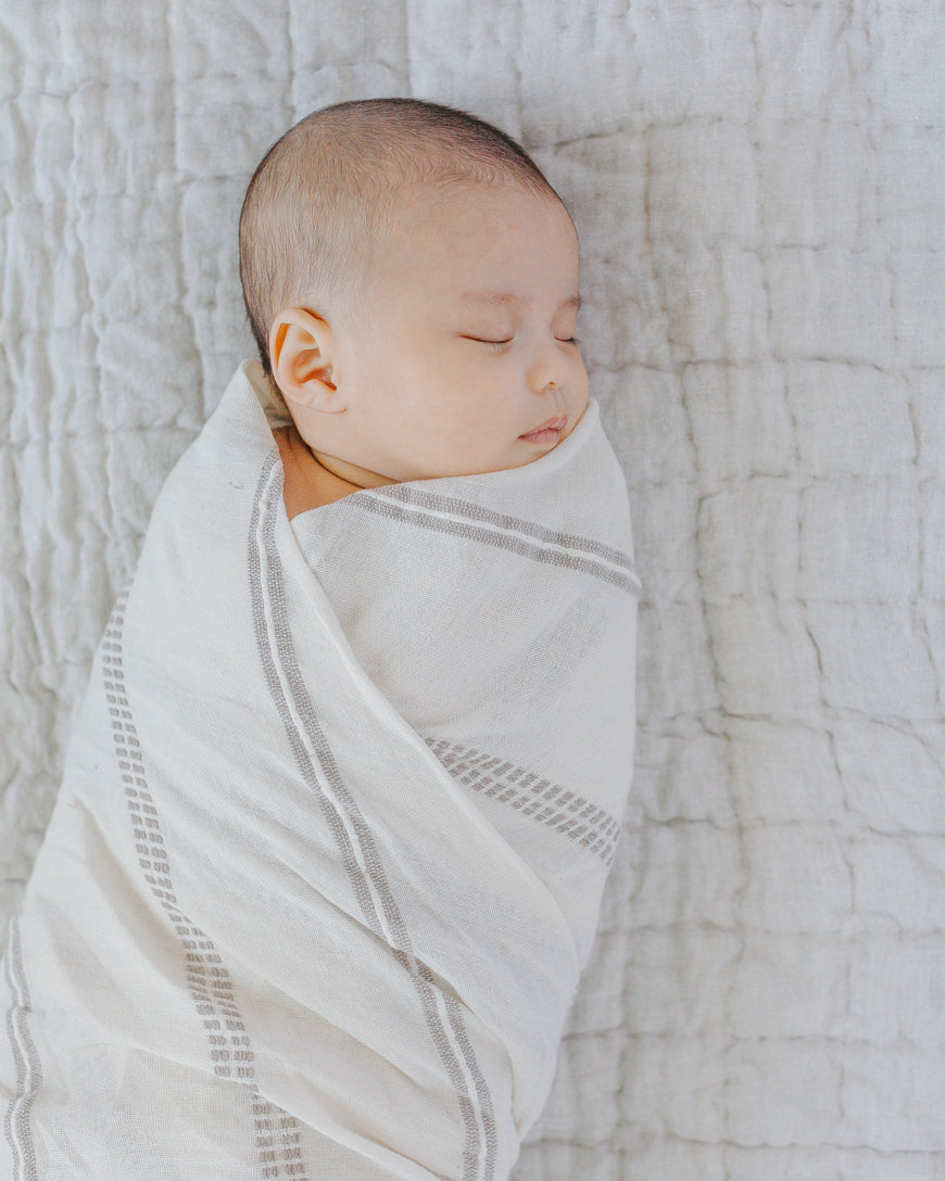 Handwoven organic cotton baby swaddle blanket, delicately soft and lightweight fabric fold — view 2