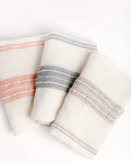 Handwoven organic cotton baby swaddle blanket, delicately soft and lightweight fabric fold