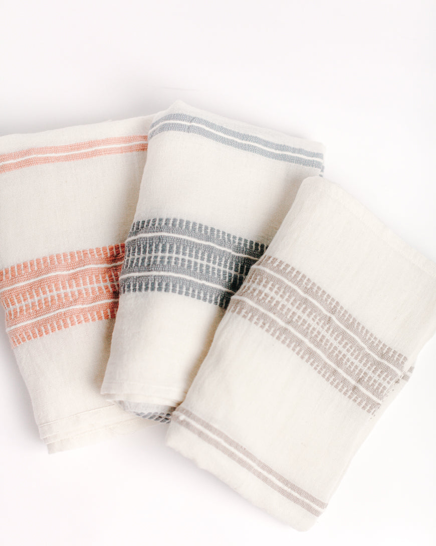 Handwoven organic cotton baby swaddle blanket, delicately soft and lightweight fabric fold