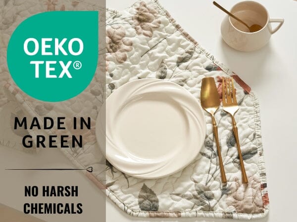 Reversible floral quilted table runner in beige and soft green for dining room tabletop protection — view 2