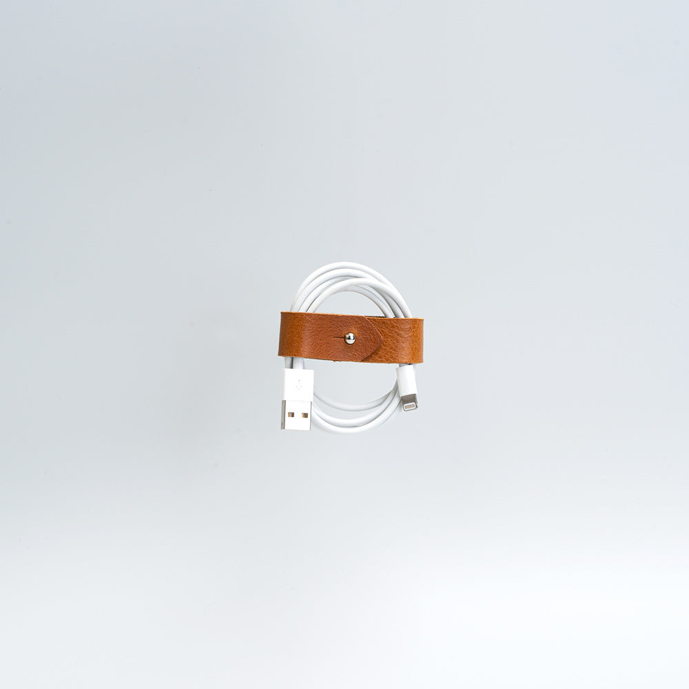 Handcrafted vegetable tanned leather cord organizer for charging cables in minimalist style — view 3