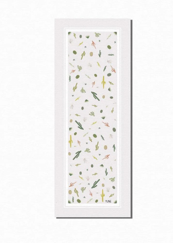Crisp white Juno yoga mat rolled up, showing 6mm thick eco-friendly non-slip PER texture.